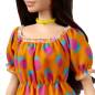 Preview: Barbie Fashionistas Doll 160 with Long Brunette Hair Wearing Patterned Orange Dress, White Shoes & Yellow Choker
