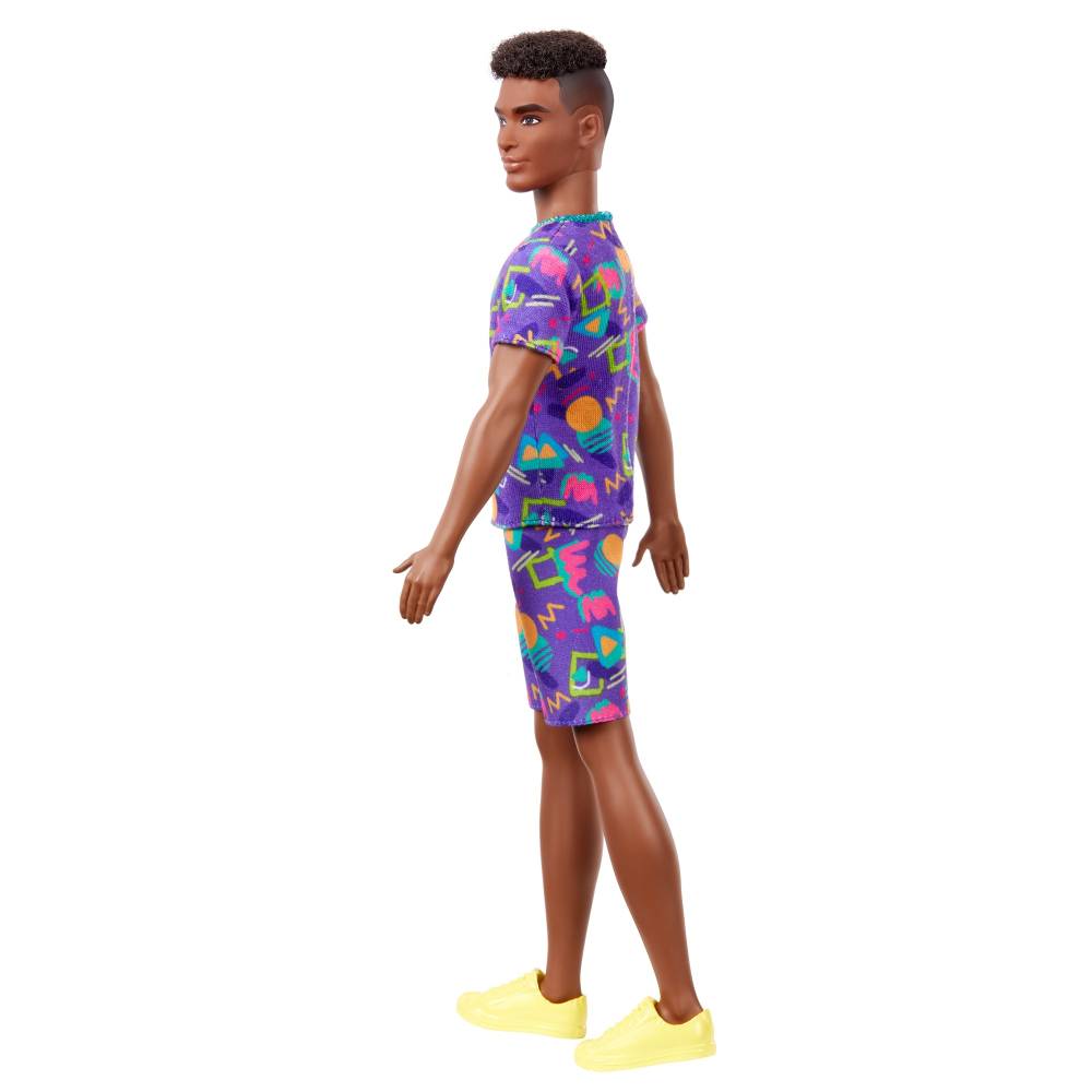 Barbie Ken Fashionistas Doll 162 with Rooted Brunette Hair Wearing Graphic Purple Top, Shorts & Yellow Shoes